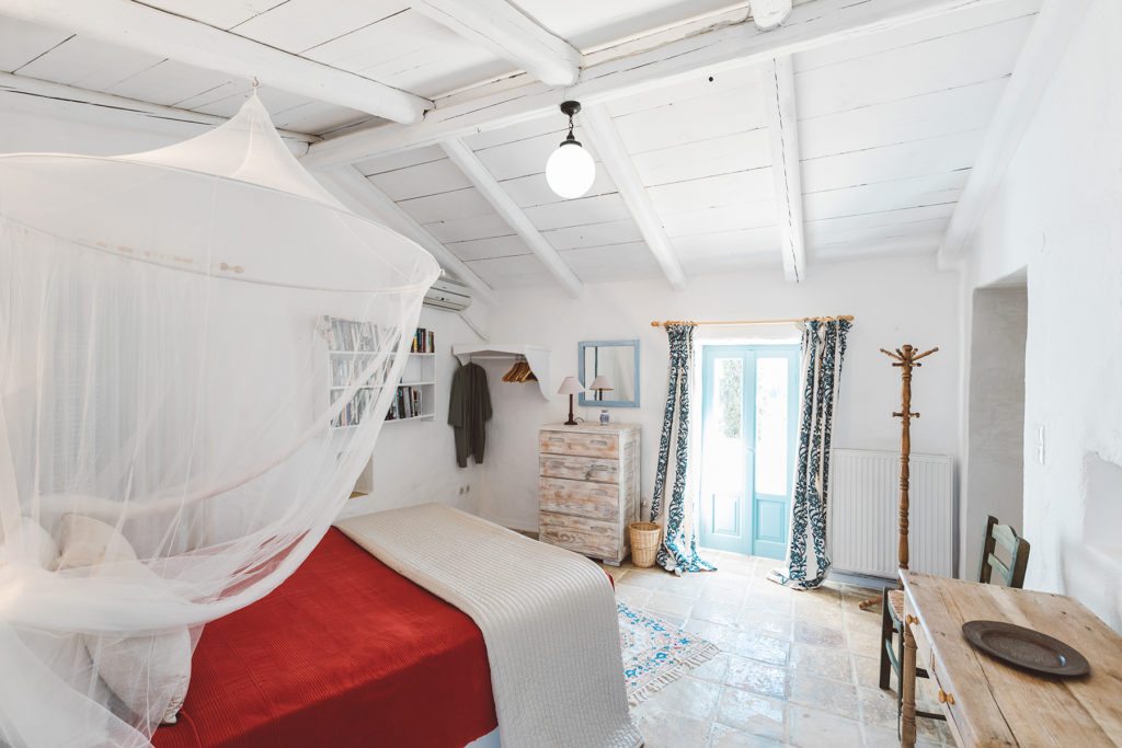 Double bedroom at Xyloporta, a luxury Greek island villa with a pool near The Peligoni Club