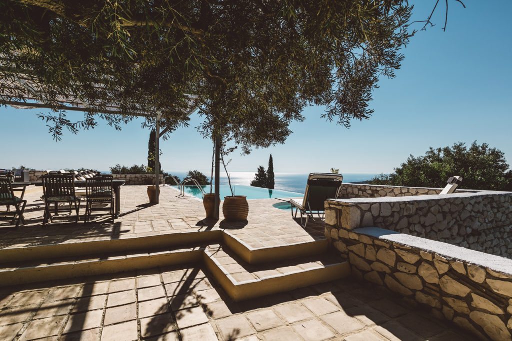 Pool area of Xyloporta, a luxury Greek island villa with a pool near The Peligoni Club