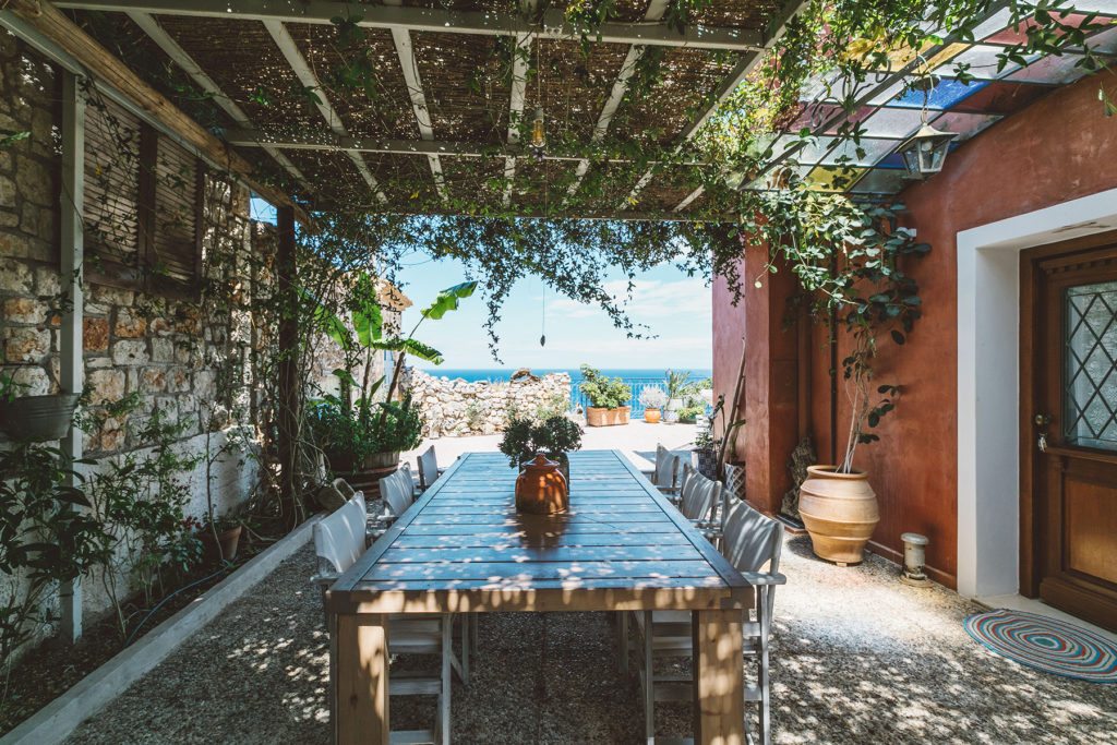 Outdoor table and view in 3 bedroom villa Alico on the Greek island of Zakynthos neat The Peligoni Club