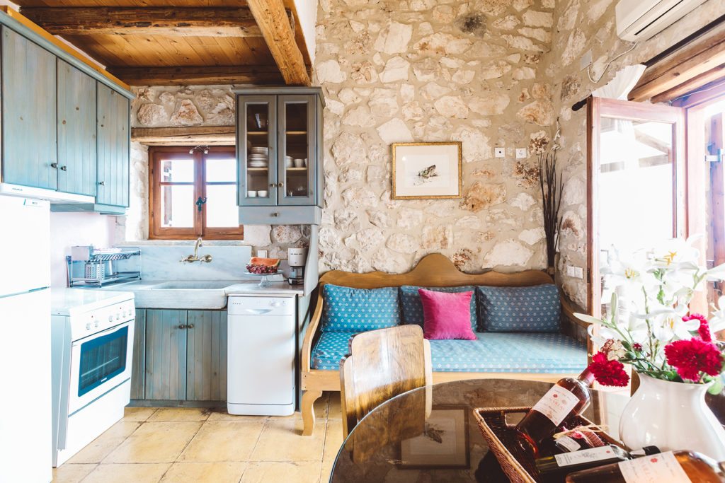 Villa Yria's quaint Greek style family kitchen and living area