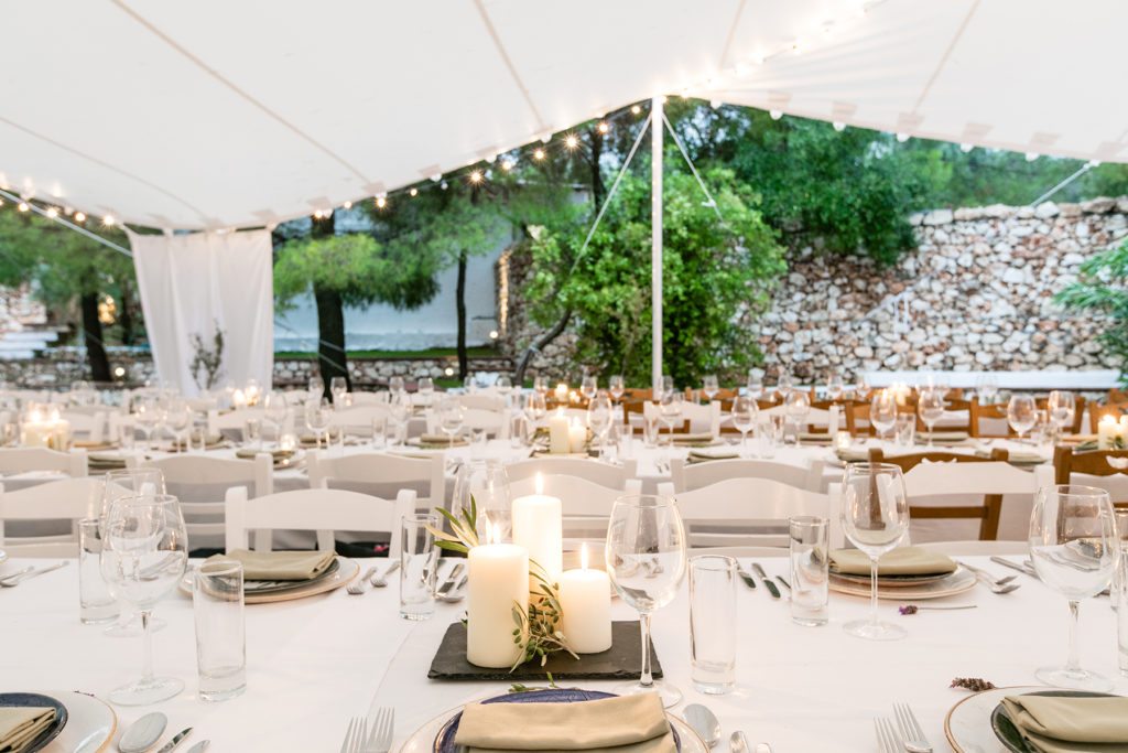 Destination wedding in Greece venue with outdoor long tables for a bespoke creative luxury wedding on an island in Greece at The Peligoni Club