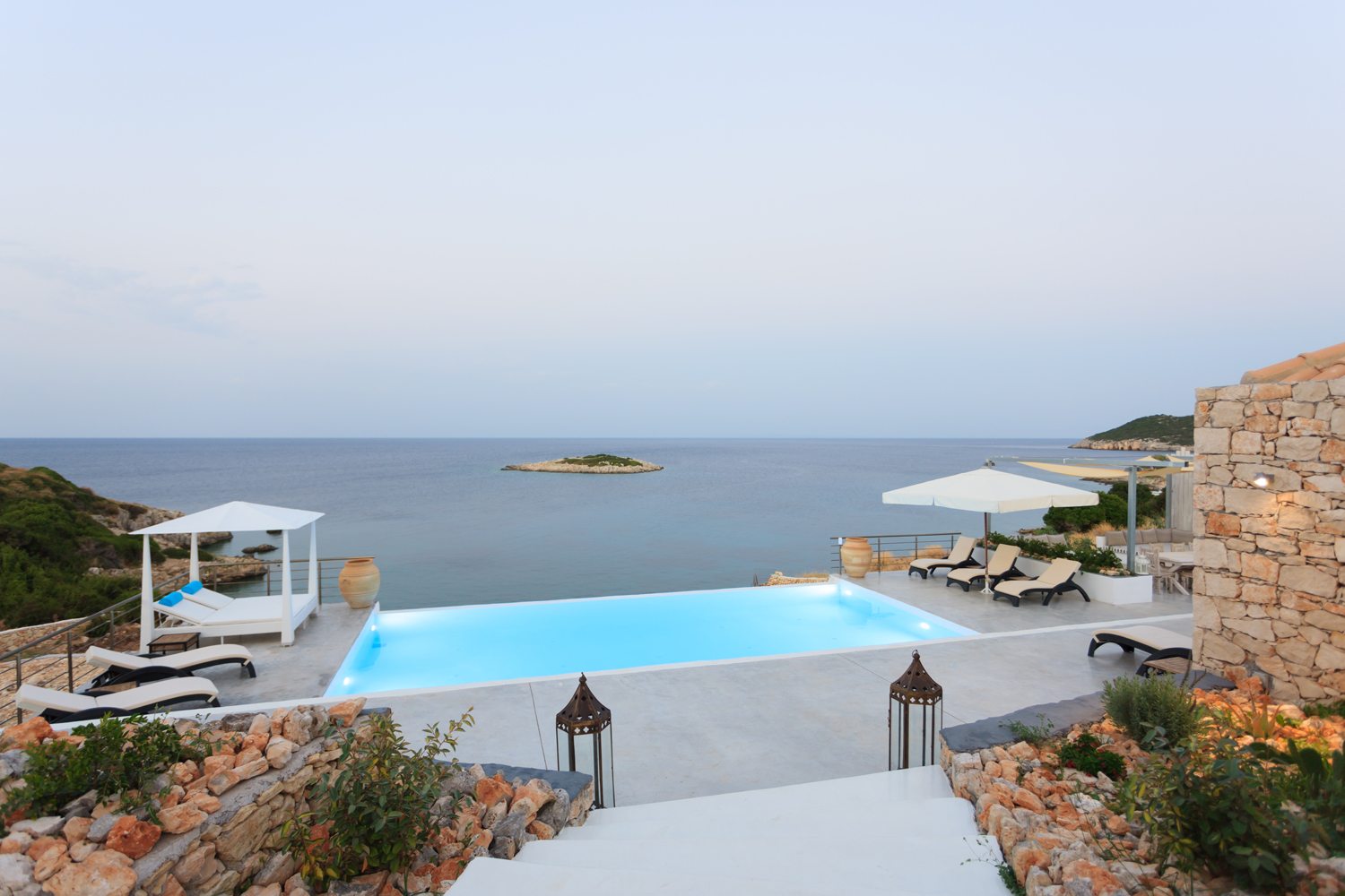 View of ocean and infinity pool of Amoulakis, a luxury villa in Greece with The Peligoni Club