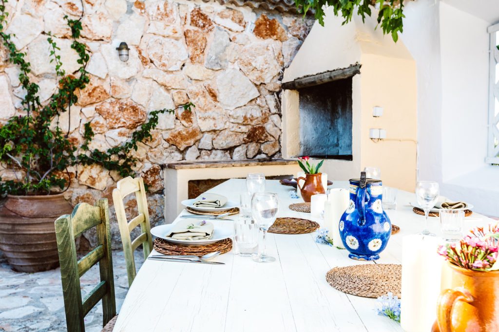 A table set for a dinner for a villa hosted evening at the Peligoni Club