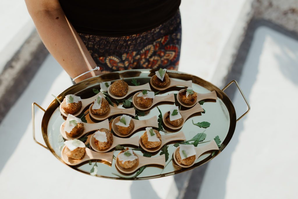 Canapés being served on a copper tray